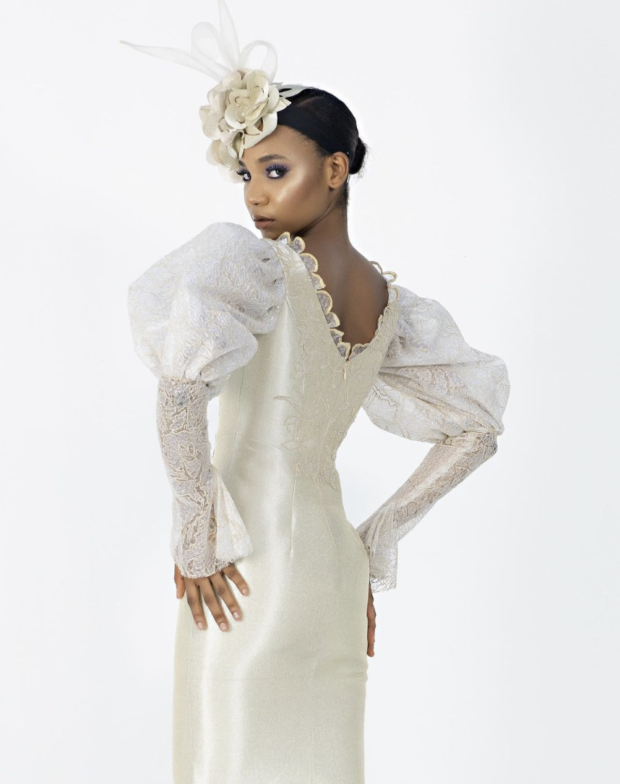 A stunning bride wearing clothing designed by Deola Sagoe