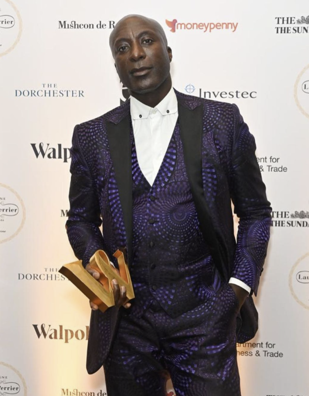 Ozwald Boateng receiving a prestigious reward.